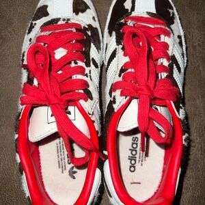 Adidas Cow Pattern Sneakers with Bold Red Laces